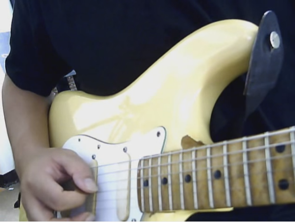 การกัดปิ๊กกีตาร์ด้วยมือขวา